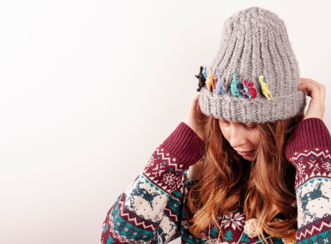 medium-shot-girl-with-dinosaurs-hat-copy-space